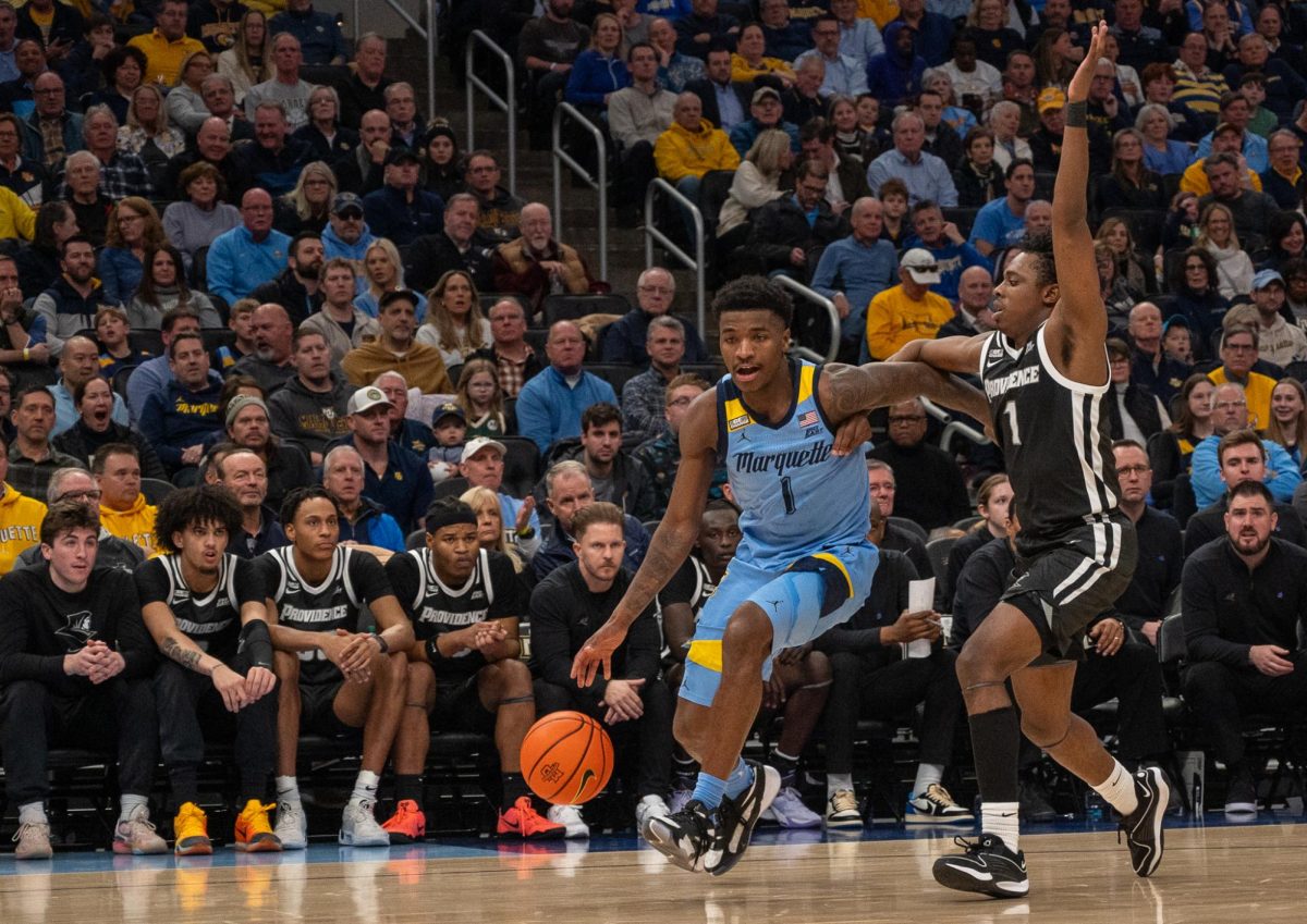 Kam Jones led Marquette with 17 points in its win over Providence. 