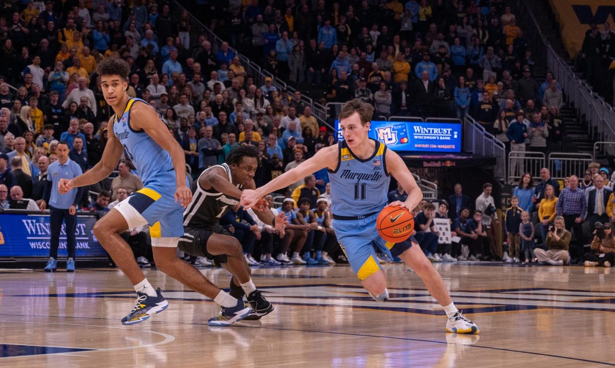 Tyler+Kolek+%28right%29+and+Oso+Ighodaro+%28left%29+have+been+playing+together+for+all+three+years+Shaka+Smart+has+been+the+head+coach+at+Marquette.