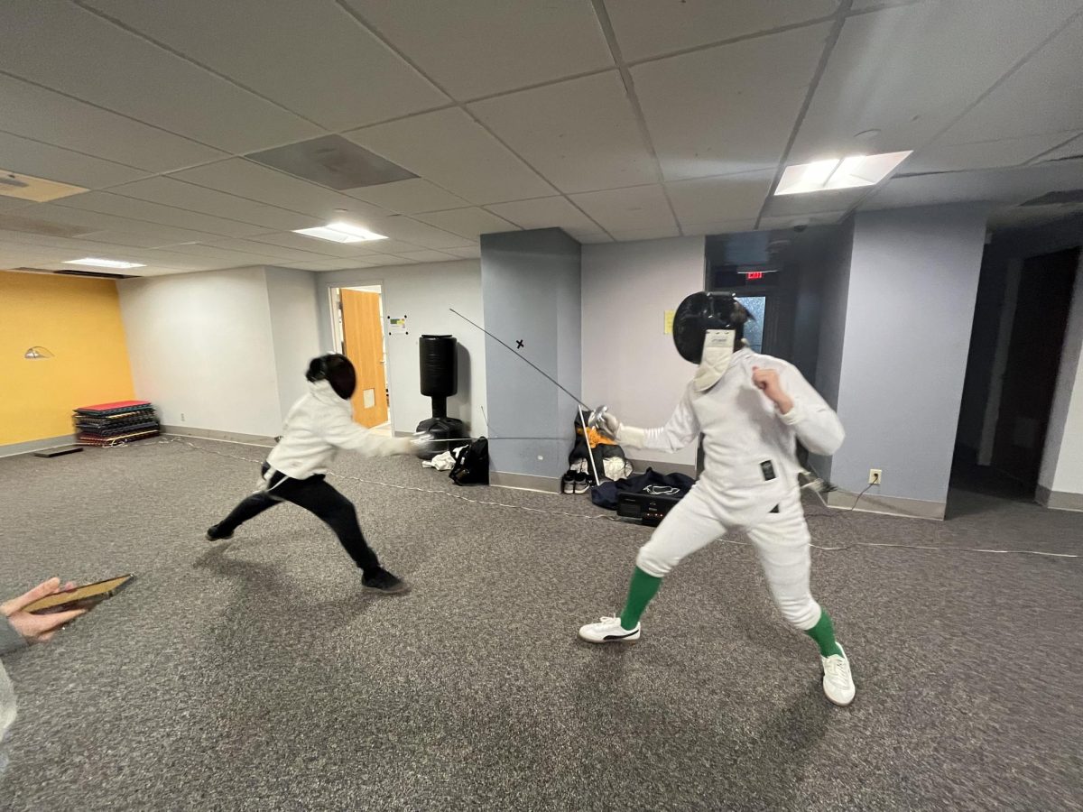 Marquette club fencing practices in Humphrey Hall three times a week.
