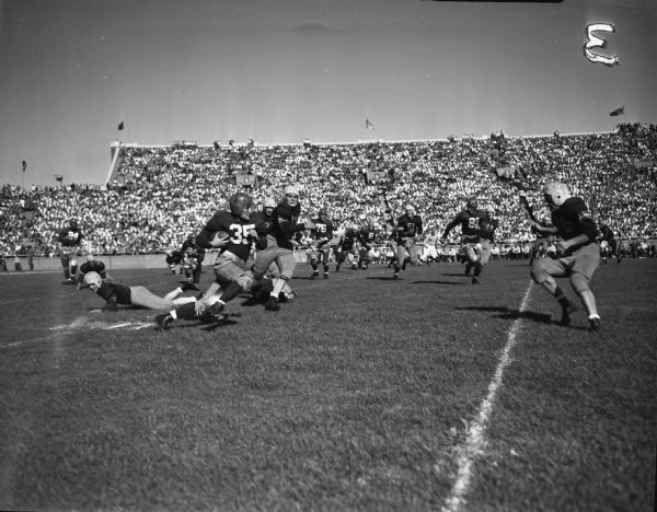 Marquette played football until 1960. While the program was still around, they played Wisconsin 36 times. (Photo courtesy of Wisconsin Historical Society.)
