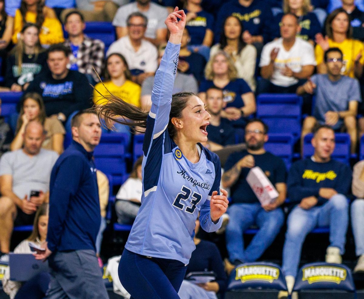 Samantha Naber posted 15 digs in Marquette's Big East opener against UConn. (Photo courtesy of Marquette Athletics.)