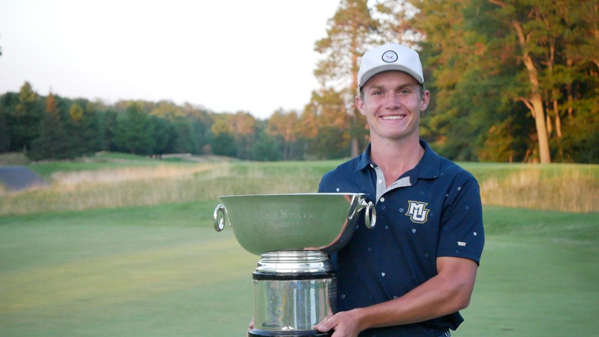 Max Lyons poses with his trophy after winning the 104th Suter Ward Group Wisconsin State Open. (Photo courtesy of Marquette Athletics.)
