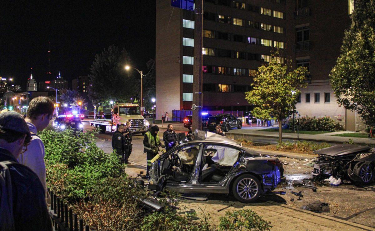 Crash in front of Evans Scholars House leaves car damaged