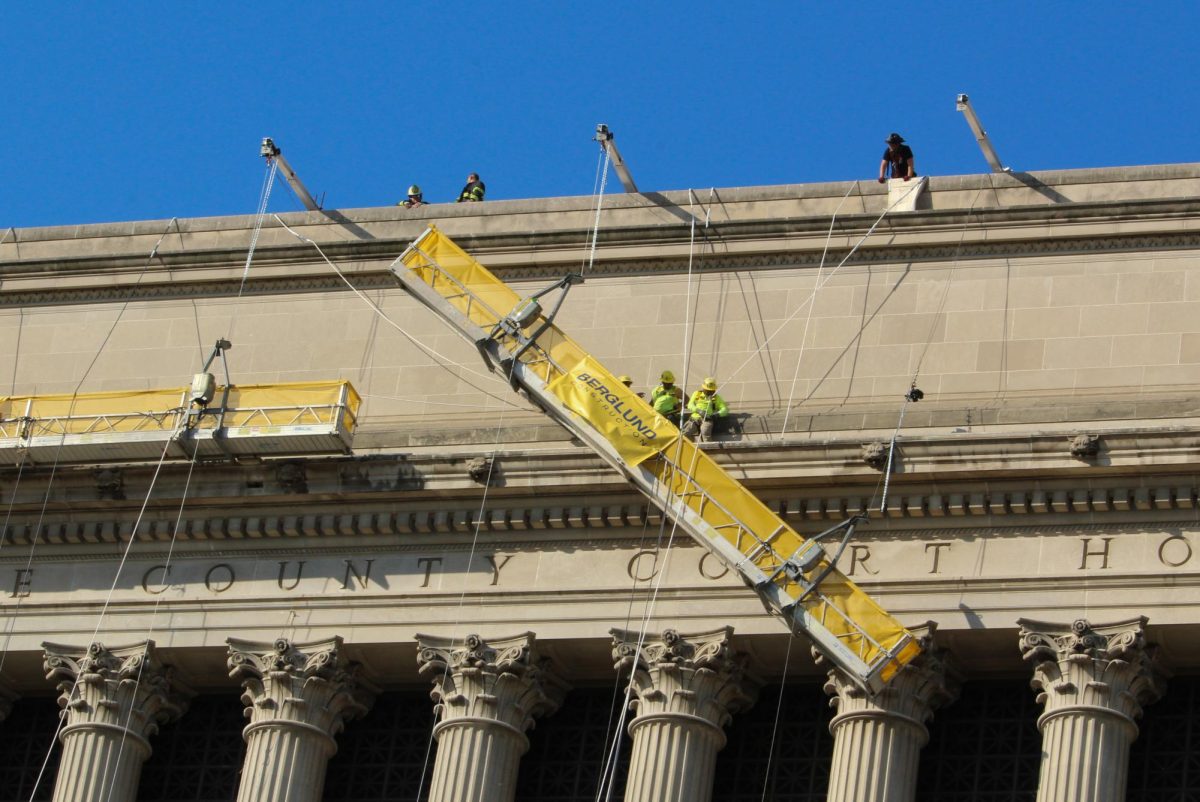 Workers were shuffled along the ledge and reached the roof with access from the second basket.