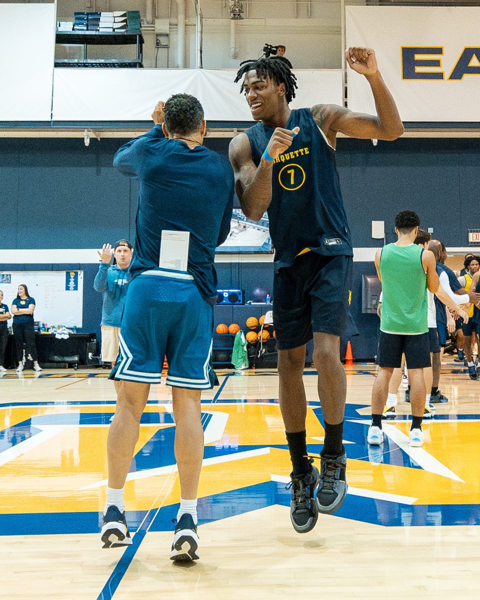 Shaka Smart has become a kind of "father figure" for Zaide Lowery. (Photo courtesy of Marquette Athletics.)