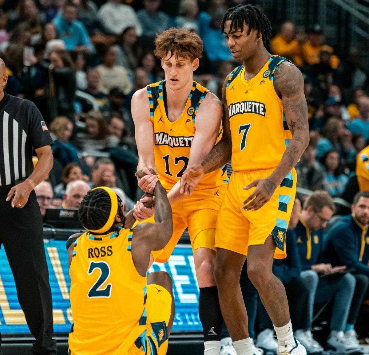 Marquette debuted throwback jerseys Wednesday night in its game against Stonehill. (Photo courtesy of Marquette Athletics.)