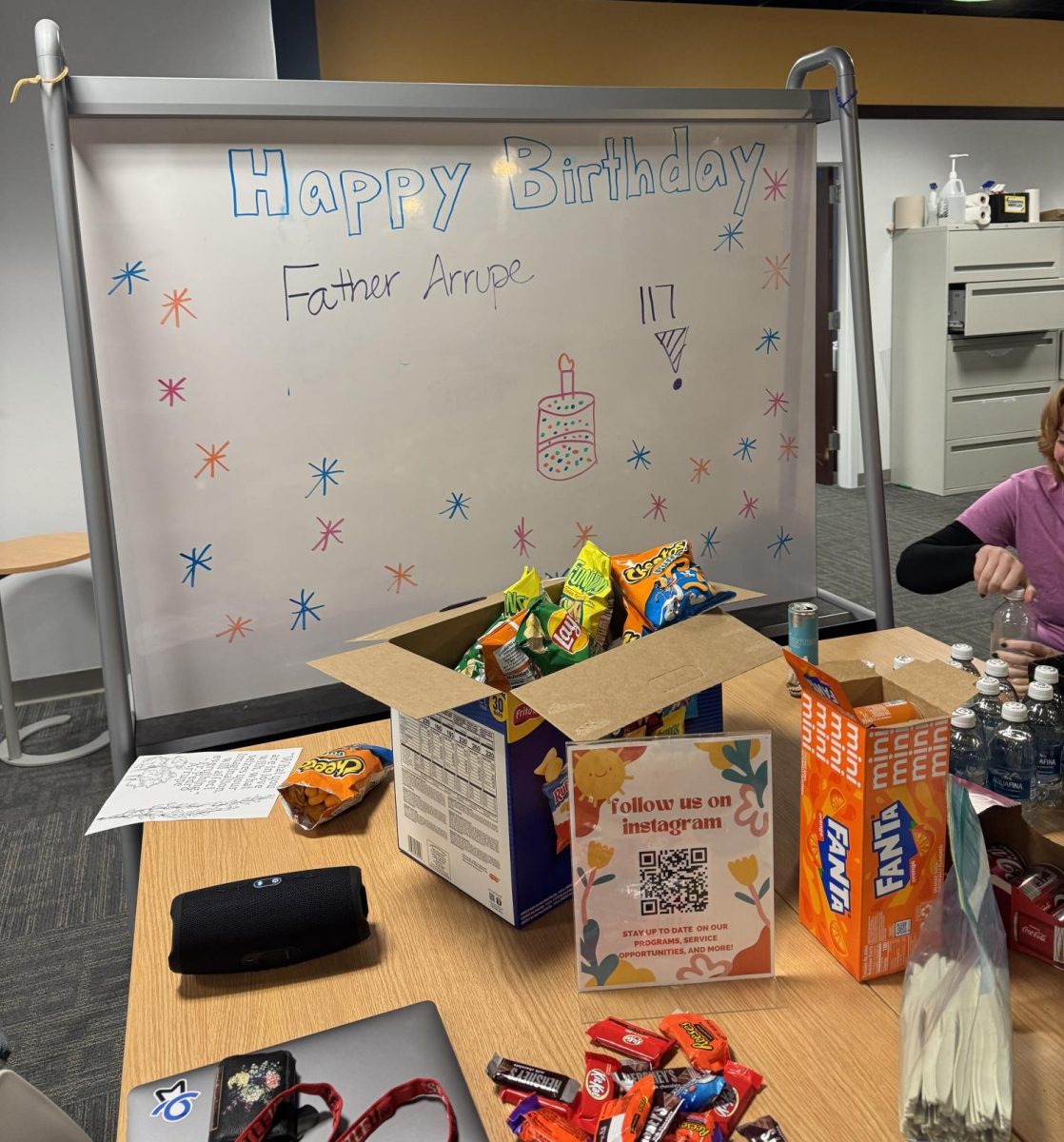 The birthday party for Father Arrupe featured an assortment of snacks, drinks and desserts.