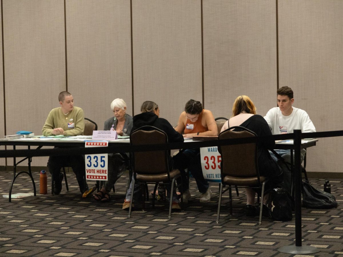 Election Day workers at the AMU polling site helped make sure voters had the documents they needed and directed them to the correct lines.