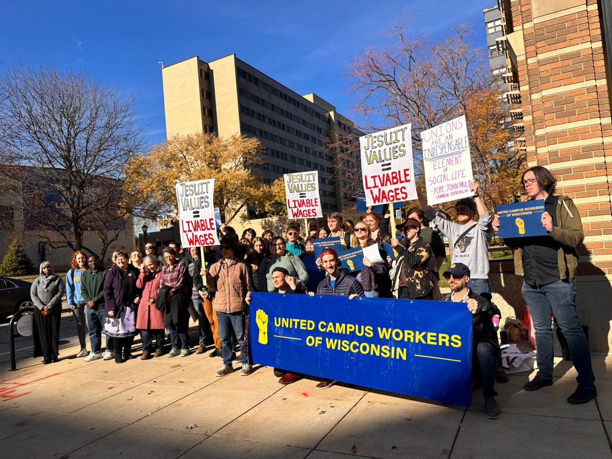 Faculty demonstrated their frustrations peacefully outside of Zilber Hall.