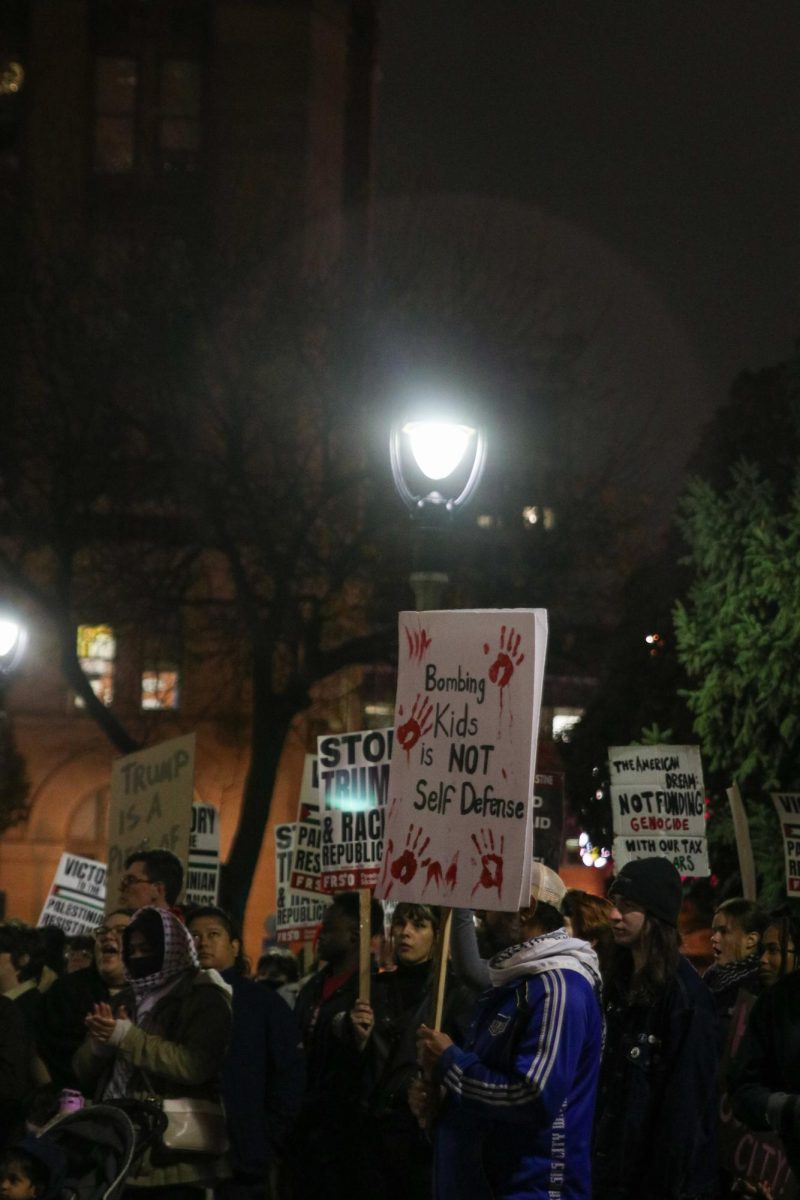 Over 100 protestors took to Red Arrow Park Wednesday night to march holding handmade signs and banners that represented their beliefs. 