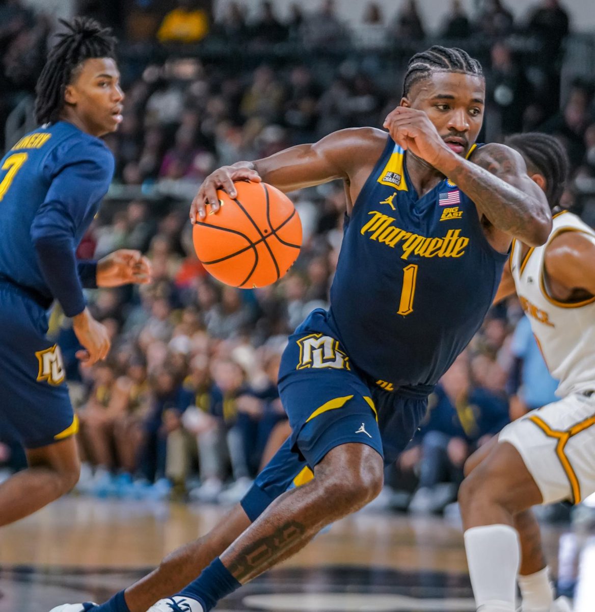 Kam Jones earned his third double-double of the year with 18 points and 10 assists in Marquette's 78-50 win over Providence. (Photo courtesy of Marquette Athletics.)