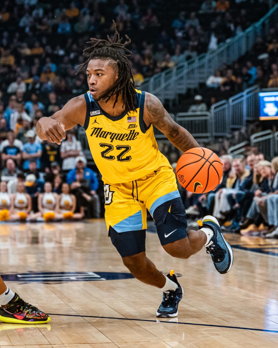 Before his injury, Jones was averaging 5.8 points and 2.0 assists per game in 16.2 minutes per contest. (Photo courtesy of Marquette Athletics).