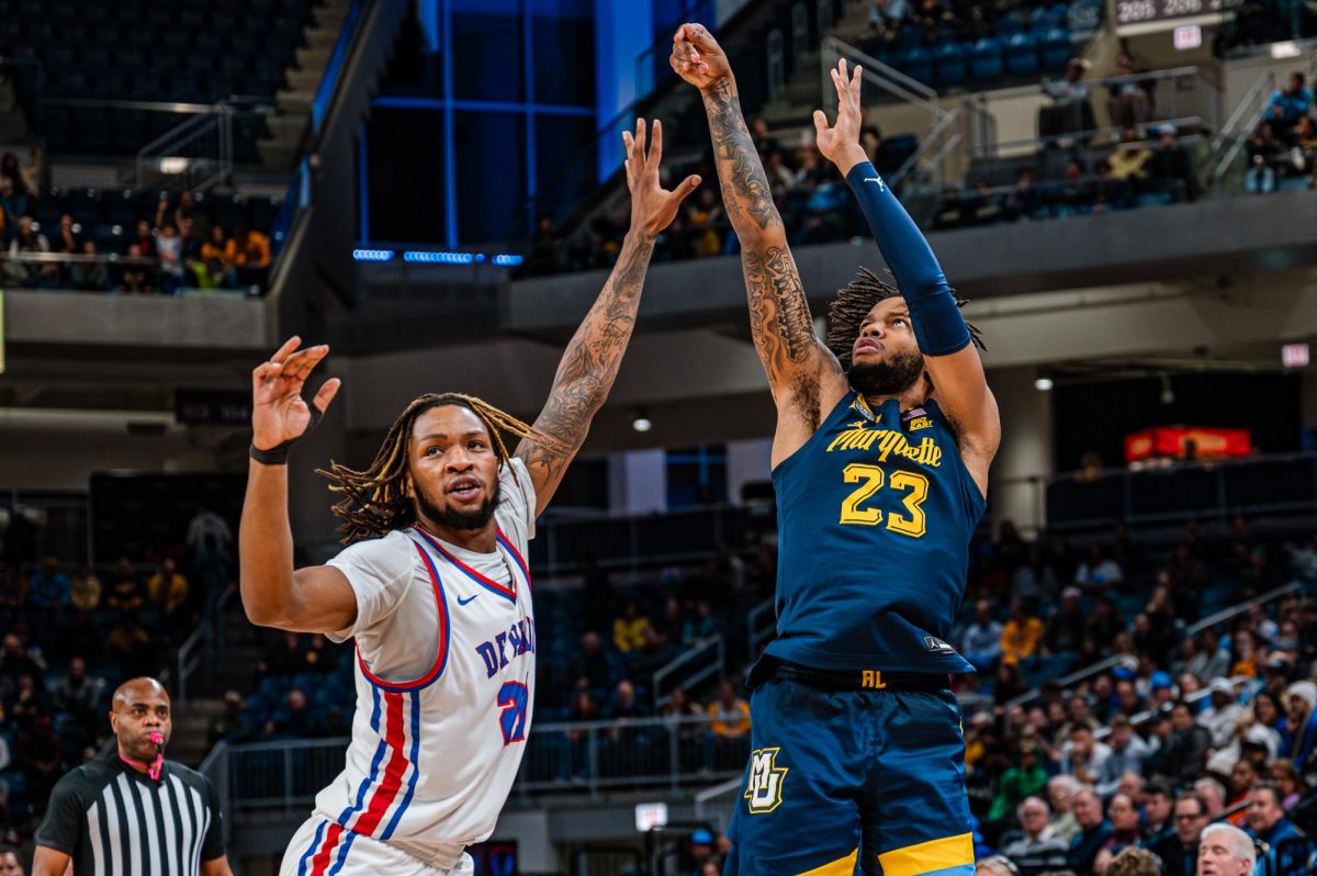 David Joplin (right) has led Marquette in scoring at Wintrust Arena in two of the past three seasons. He had a game-high 32 points in Marquette's 85-83 overtime win at DePaul Tuesday night.