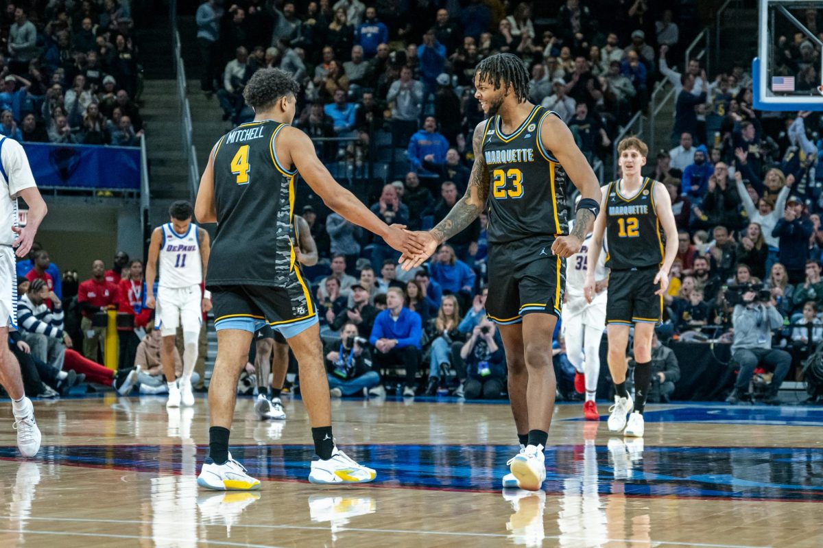 David Joplin (right) has led Marquette in scoring at Wintrust Arena in two of the past three seasons. He had a game-high 32 points in Marquette's 85-83 overtime win at DePaul Tuesday night.