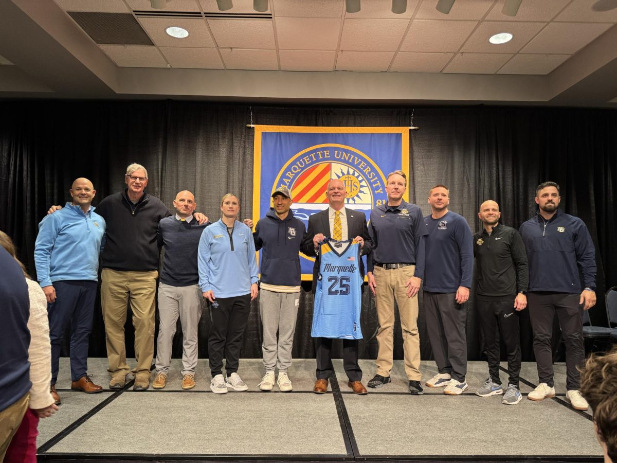 Mike Broeker is joined by Marquette Athletics head coaches after his introductory press conference at the Alumni Memorial Union on Thursday, Jan. 23.