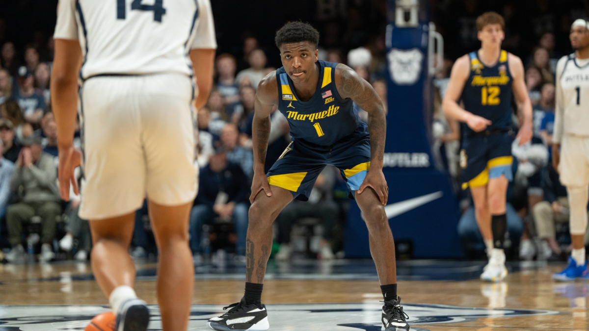 Kam Jones guards the ball in Marquette's 78-72 win at Butler on Feb. 13, 2024.