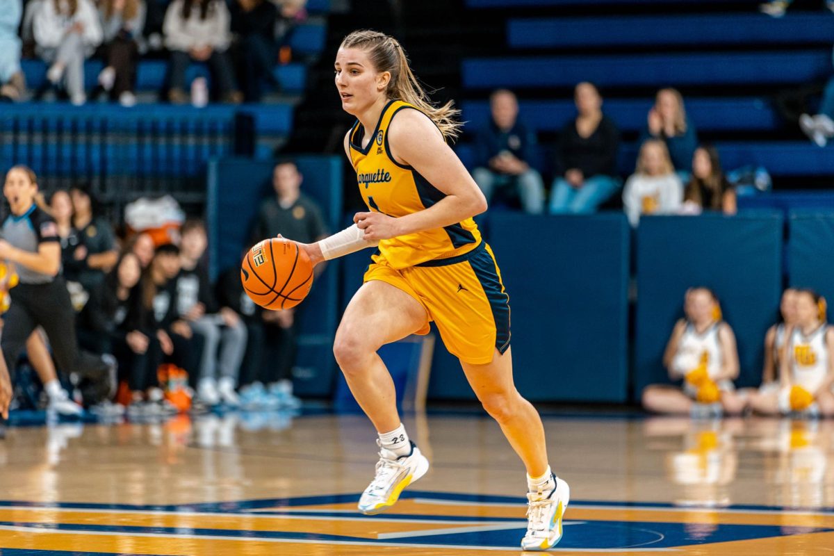 Marquette honored Lee Volker (pictured above) and Abby Cracknell before the game as part of its senior night.