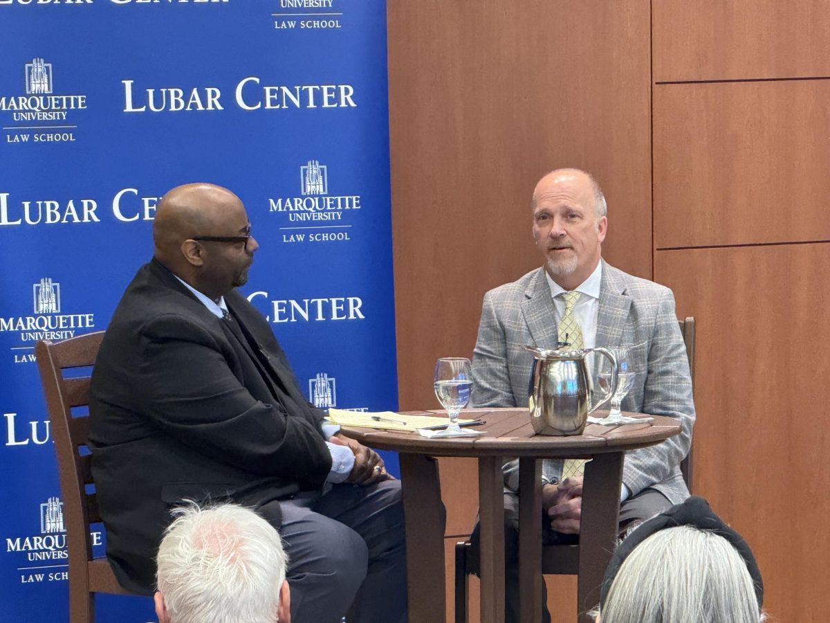 Derek Mosley, director of the Lubar Center, hosted Schimel as part of the center's "Get to Know" program series.