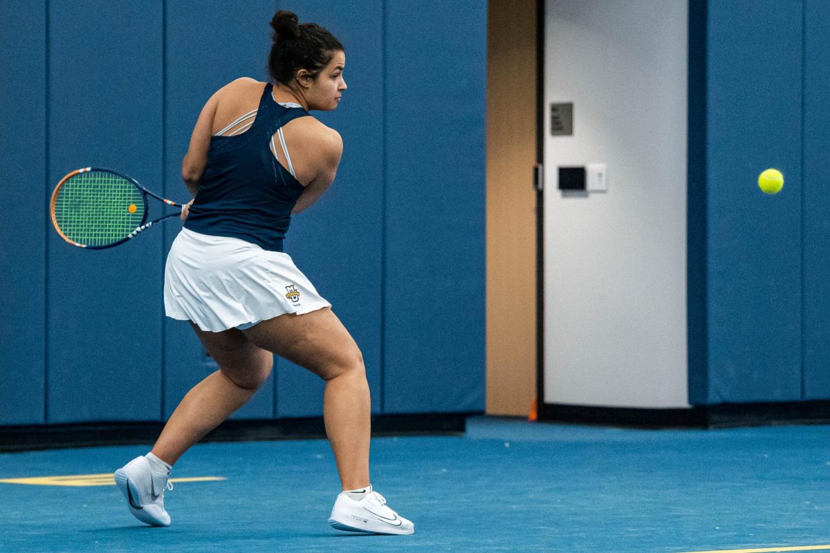 Senior Tiera Jarmond is on a five-match winning streak in singles play, earning her 13th win of the season against Drake Feb. 28. (Photo courtesy of Marquette Athletics.)