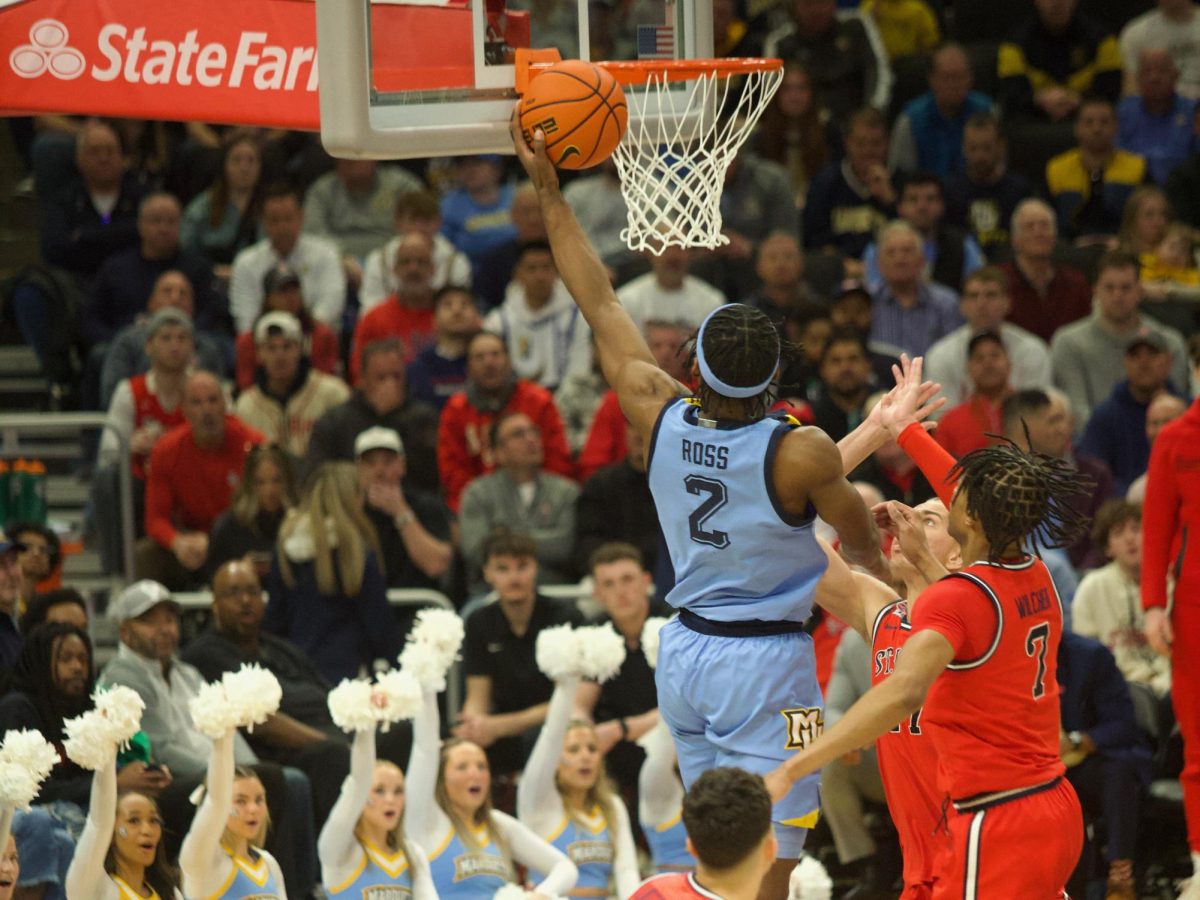 Chase Ross (2) attempts a layup during Marquette's regular season finale against St. John's on Saturday, March 8th.