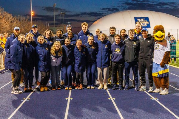 Marquette's track and field seniors pose for a picture after the meet.