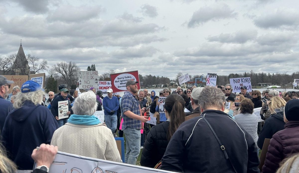 Hands Off! protesters, led by Mike Van Someren, gathered in the Village Green where they acquired a permit to assemble.