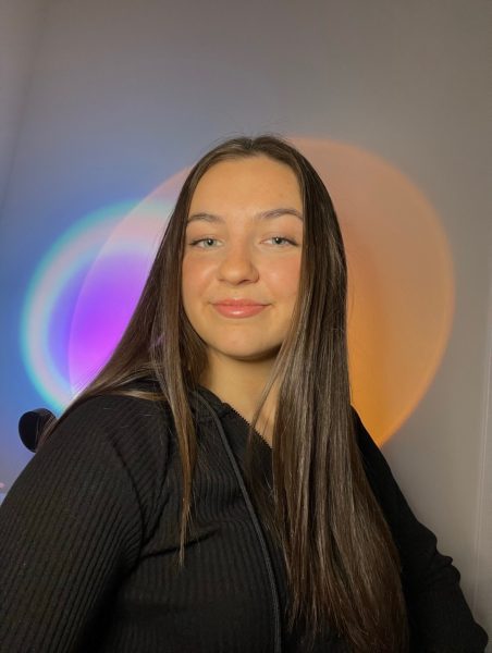 Navigation to Story: Viral sports logo designer and Marquette alum Emily Morgan takes social media by storm