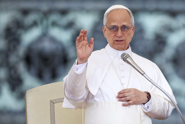 Pope Leo XIV blesses faithfuls as he holds his first general audience in St. Peter's Square, at the Vatican, May 21, 2025. REUTERS/Guglielmo Mangiapane