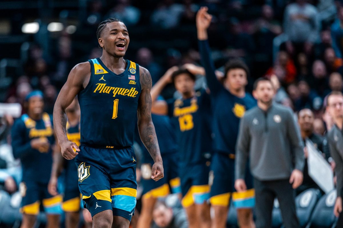 Kam Jones finished second all-time at Marquette in scoring, amassing 2,044 total points.