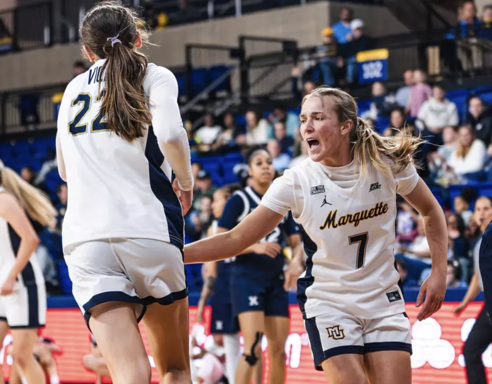 Bridget Utberg (right) and Halle Vice made the 'extra degree plays' that went into Marquette's senior night win.