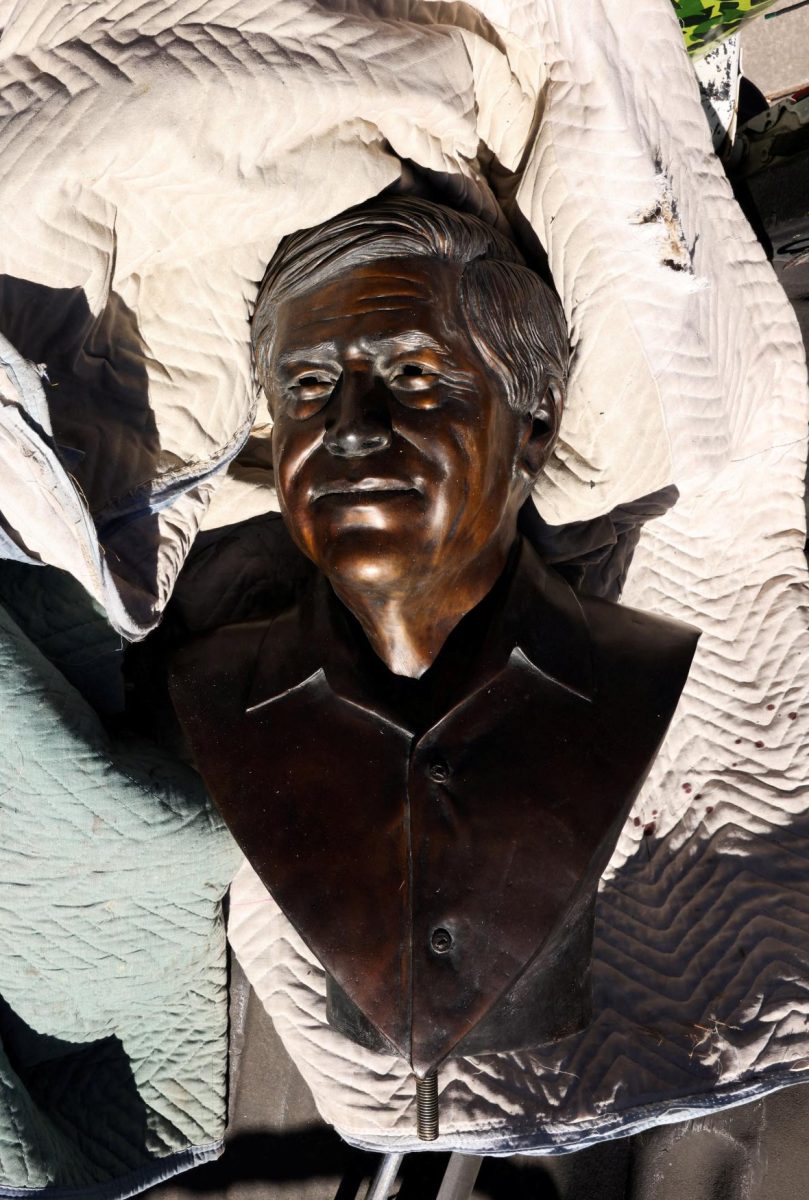A bust of United Farm Workers union co-founder Cesar Chavez sits in the back of a Denver Parks and Recreation pickup truck following its removal from Cesar Chavez Park, after civil rights leader Dolores Huerta accused Chavez of sexually assaulting her in the 1960s, at Cesar Chavez Park in Denver, Colorado, U.S., March 19, 2026. REUTERS/Kevin Mohatt