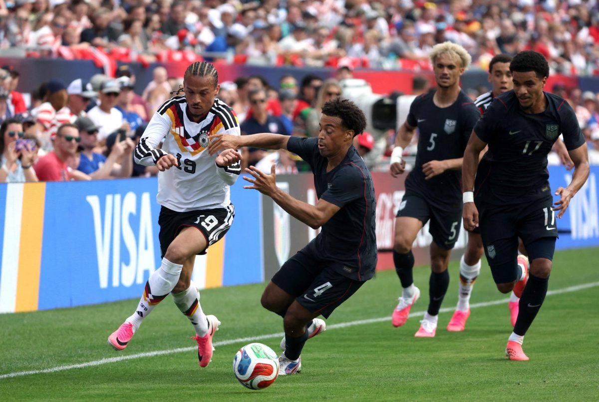 Soccer Football - International Friendly - United States v Germany - Soldier Field, Chicago, Illinois, U.S. - June 6, 2026 Germany's Leroy Sane in action with Tyler Adams of the U.S. IMAGN IMAGES via Reuters/Talia Sprague